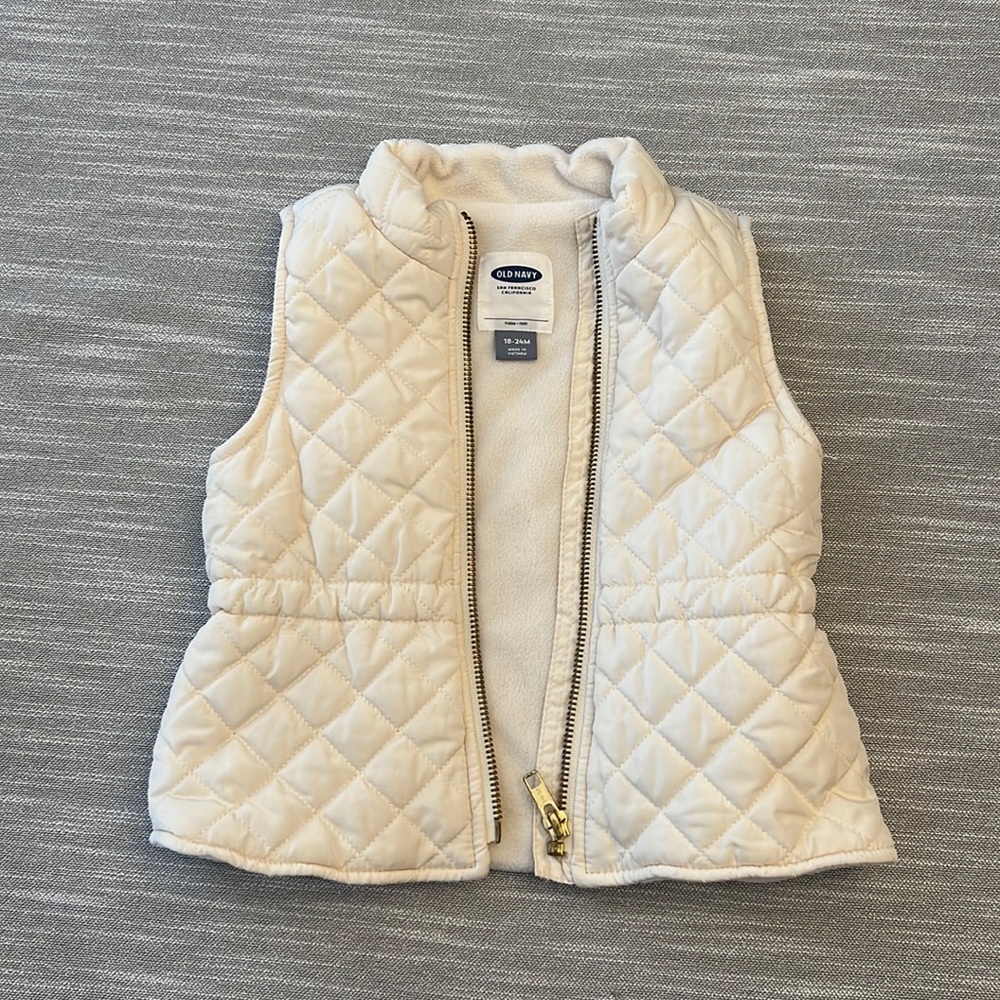 Cream colored vest